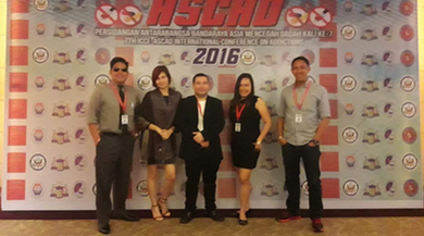 Five people pose at ASCAD 2016 conference