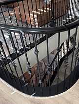 Interior wooden stair railing painted by PME Painting