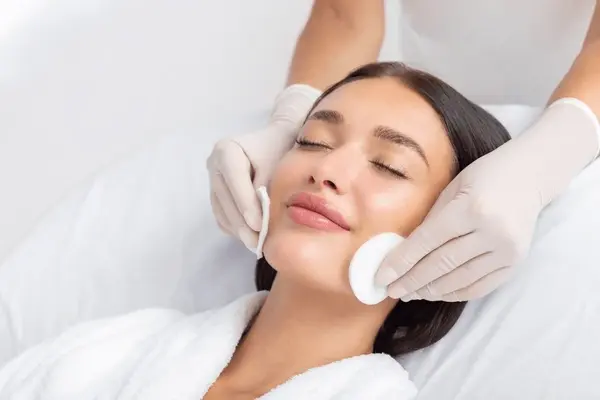 female-beautician-cleansing-skin-young-600nw-2496076153.webp