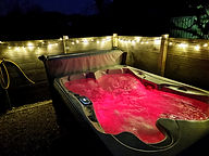 Our Squirrel Pod with fancy Red Hot tub Lights making an amazing atmoshere