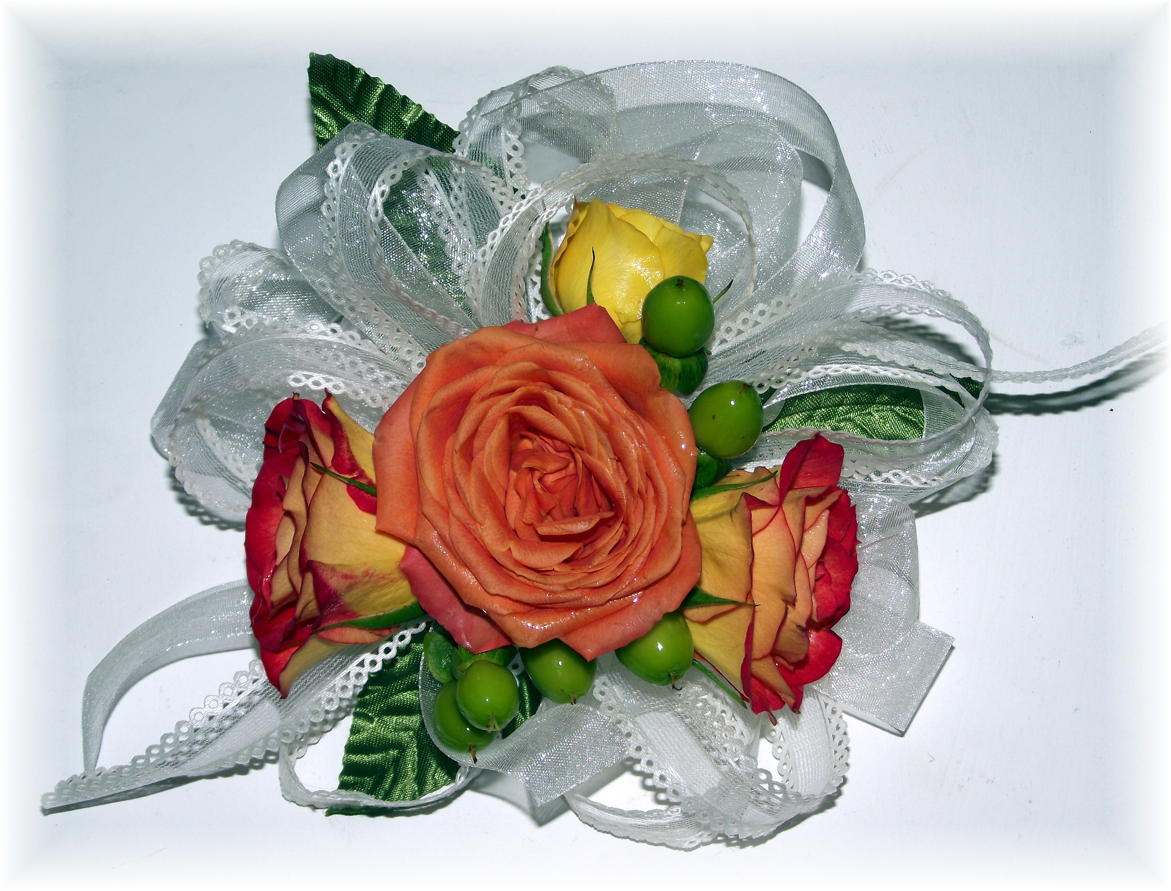Spray roses & hypericum corsage