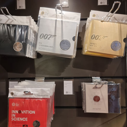 commemorative coins in plastic pouches all about 007 james bond
