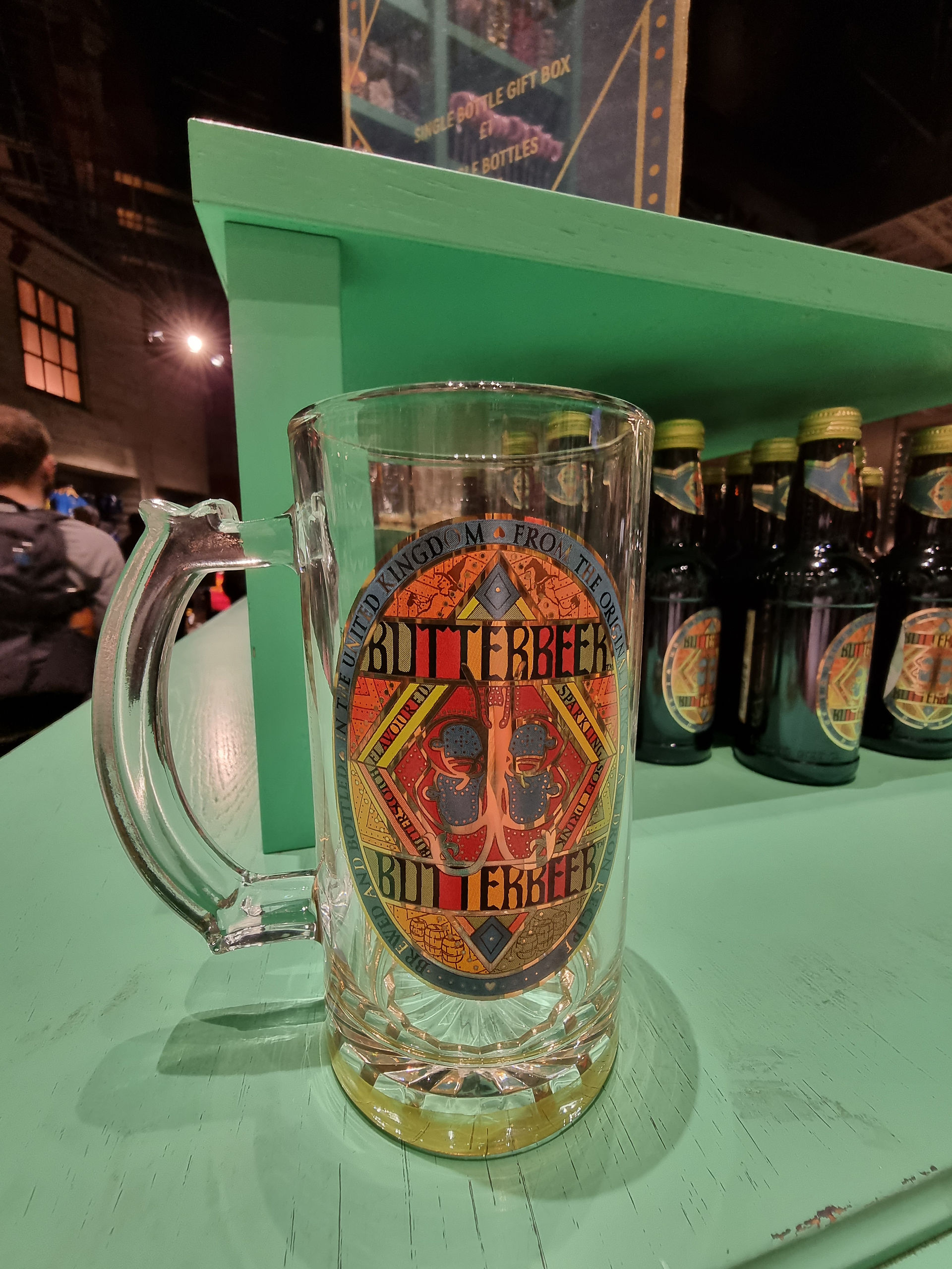 glass with butterbeer label