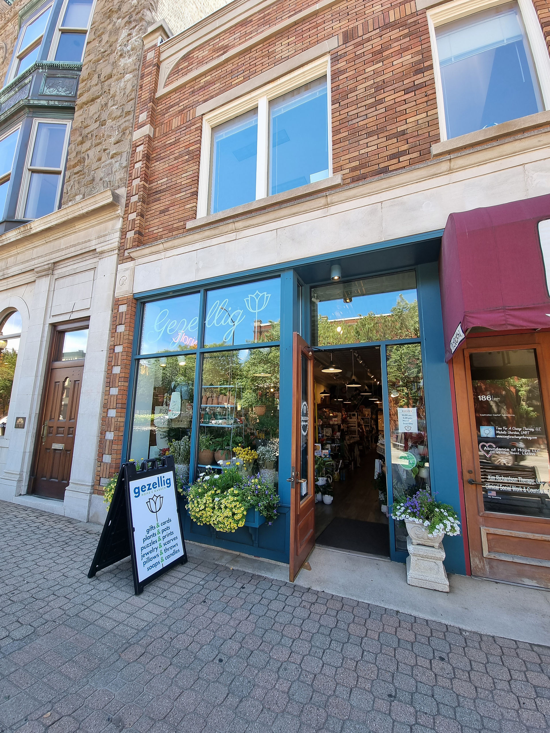 shop facades in holland michigan, this one is gezellig flower store