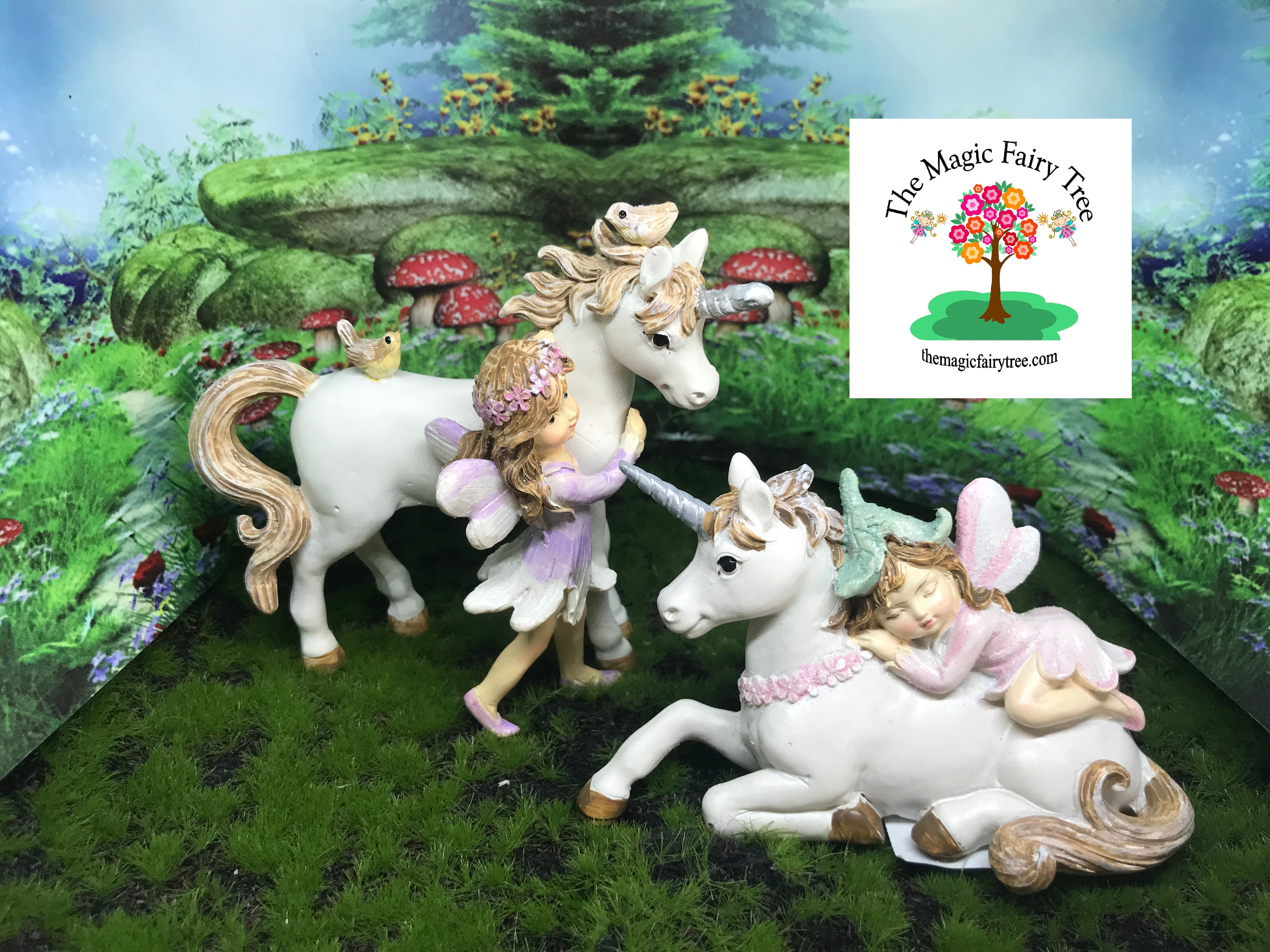 Little fairy with unicorn figurine