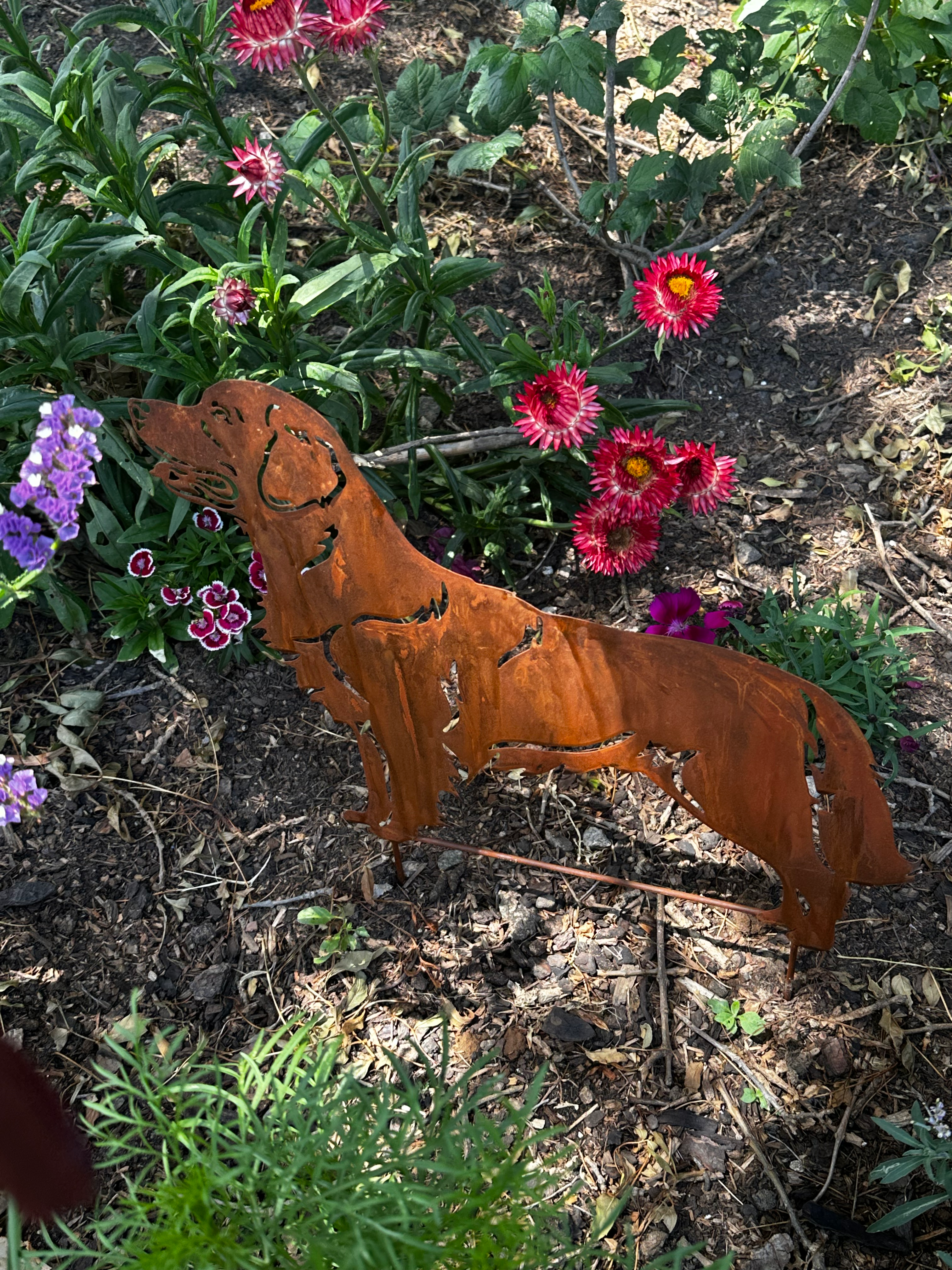 Rusty metal Labrador retriever stake
