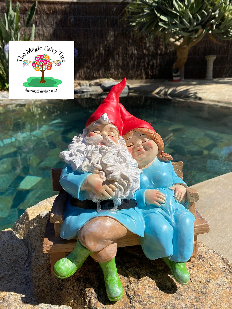 Thumbnail: Mr and Mrs Gnome sitting on a bench