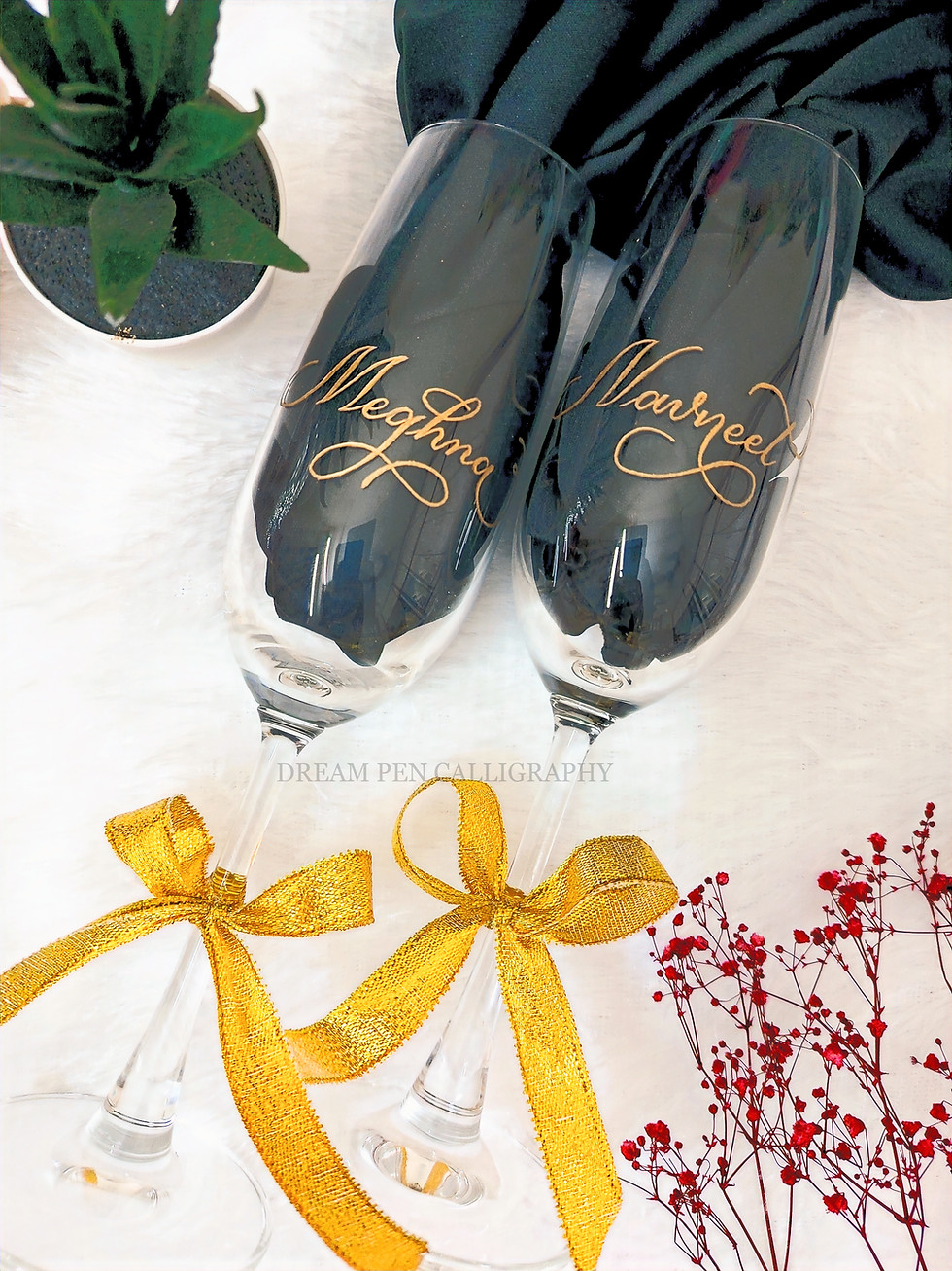 Personalised champagne flutes for proposal gift with gold calligraphy engraving