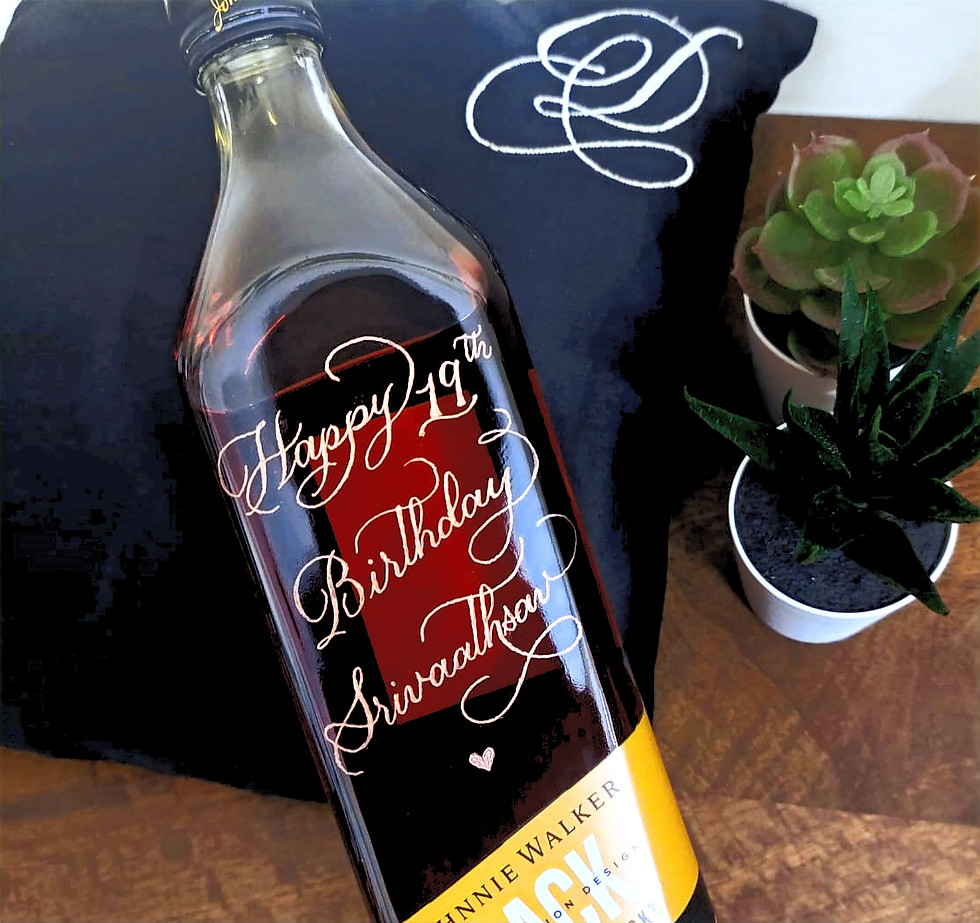 Custom engraved liquor bottle with personalised calligraphy for birthday and anniversary gifting