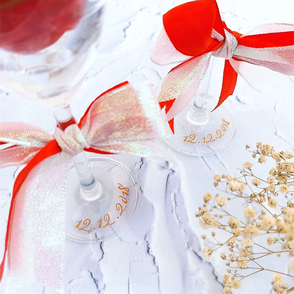 Thumbnail: Hand engraved wine glasses of special dates with elegant ribbon styling for anniversary and Valentine’s Day gifts