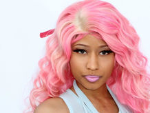 Nicki Minaj Says She Wanted to Punch Travis Scott 'in His F***ing Face' On Ellen