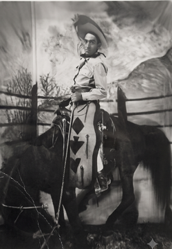 man posing as a cowboy