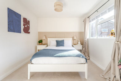 Bedroom 1 with window and wardrobe