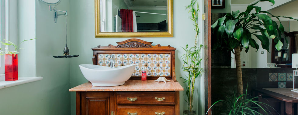Elegant Victorian sink with a charming drawer set underneath, showcasing ornate details and vintage craftsmanship for a touch of old-world sophistication.