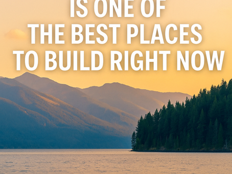 Scenic view of a calm lake surrounded by forested mountains at sunset, with the text "Why North Idaho Is One of the Best Places to Build Right Now" and the Heartstone Custom Homes logo.