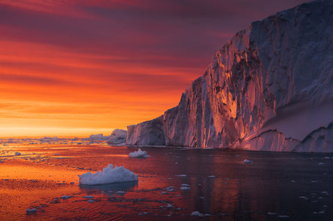 spectacular midnight sun colours in greenland.