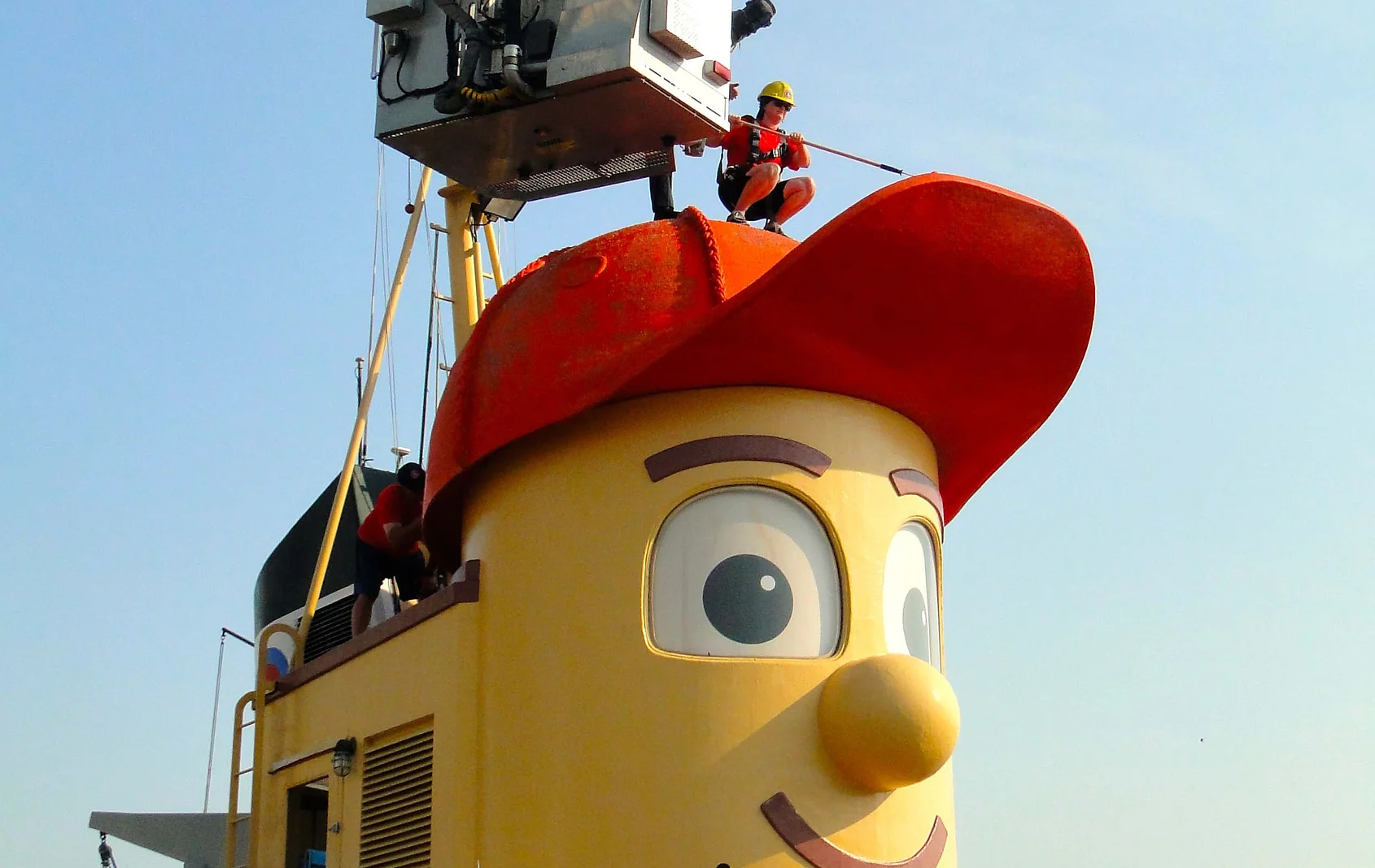 Firefighter Paints Theodore Tugboat Hat.webp