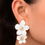 Thumbnail: White Double Flower Drop Statement Earrings