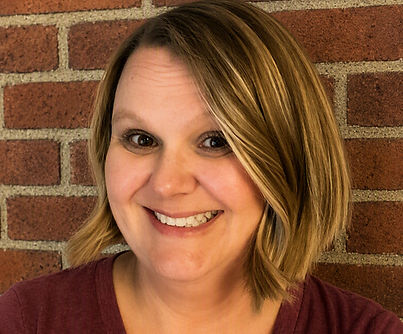 Danielle Hoy Head Shot with Bricks_edite