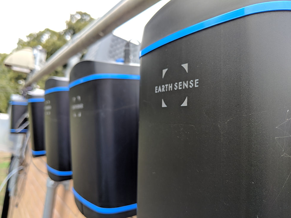 Zephyrs air quality monitors lined up mounted at a EarthSense AURN Calibration Site