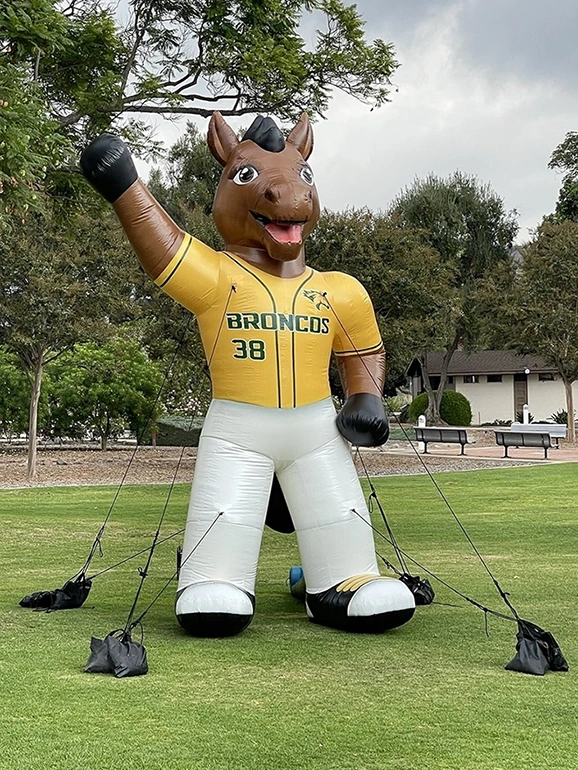 Cal Poly Pomona Broncos inflatable mascot in yellow jersey for campus event display