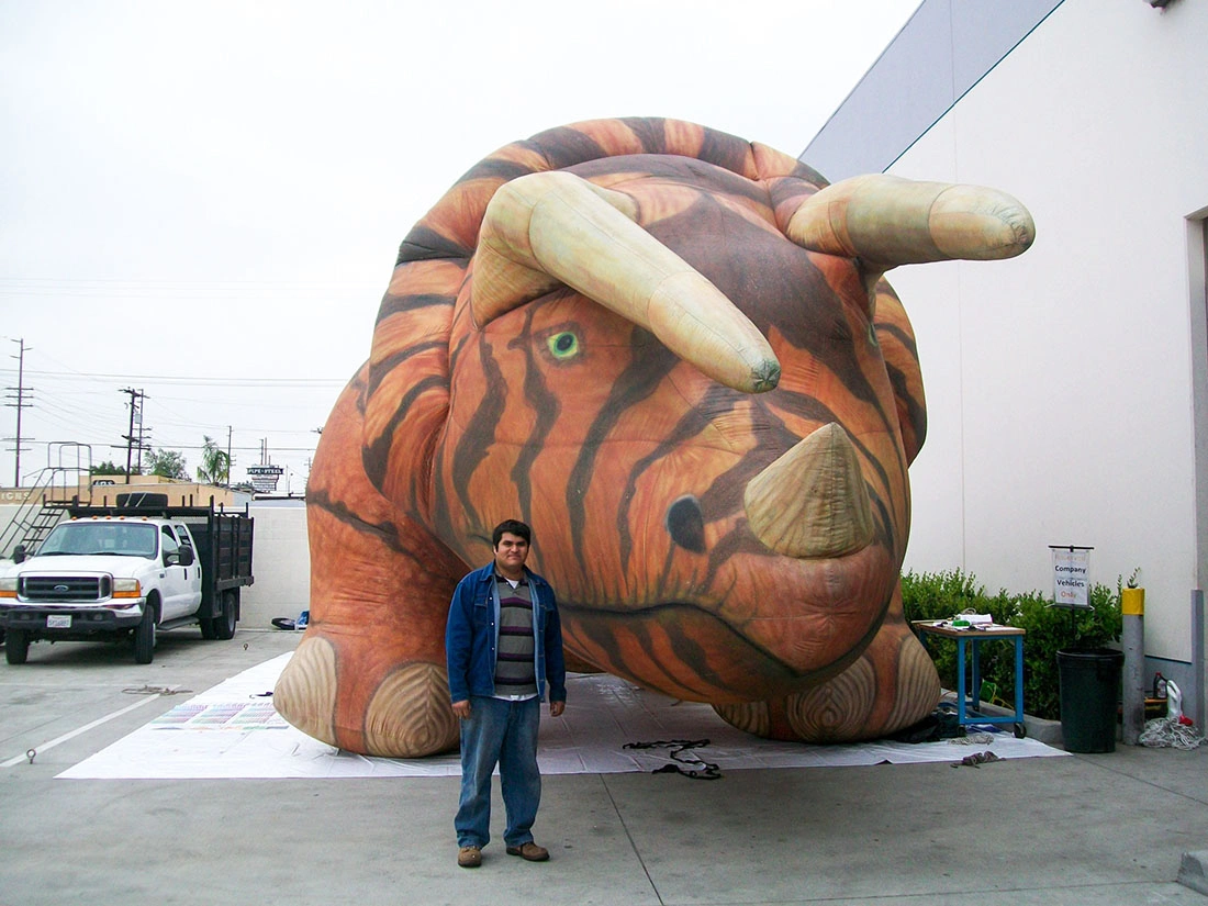 Giant inflatable triceratops front view display set up outdoors for events and promotions