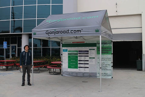 Custom gable tent with printed educational panels for GanjaRoad cannabis awareness