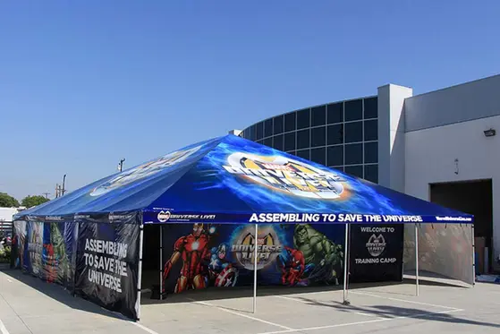 Custom 20x30 canopy tent with full Marvel branding and printed walls used at themed youth training event