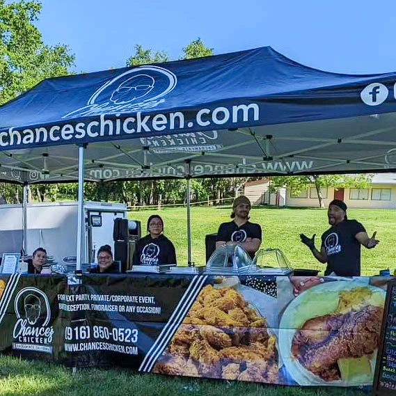 Custom printed tent with logos for a food vendor