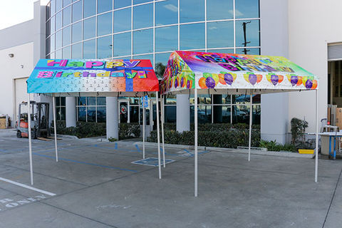 Gable tent with printed balloon graphics for birthday party use
