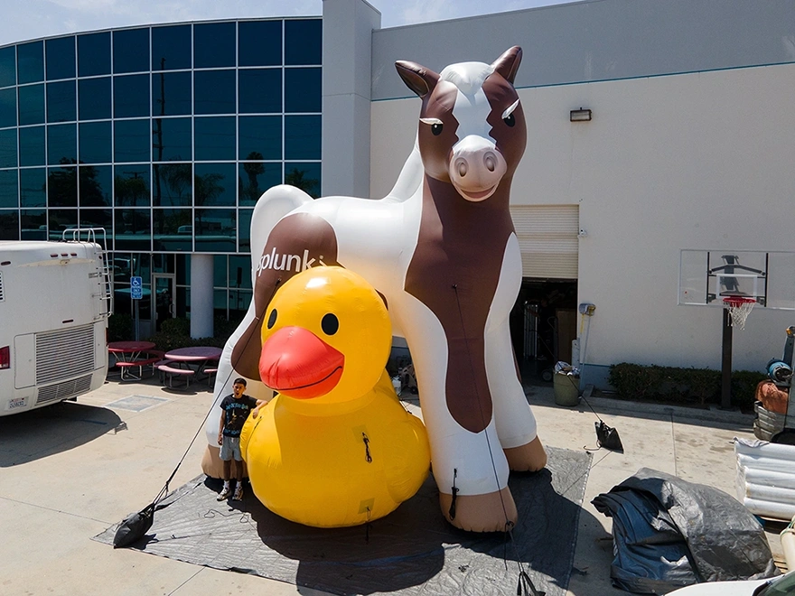 Custom inflatable horse and duck display for branding and promotional events