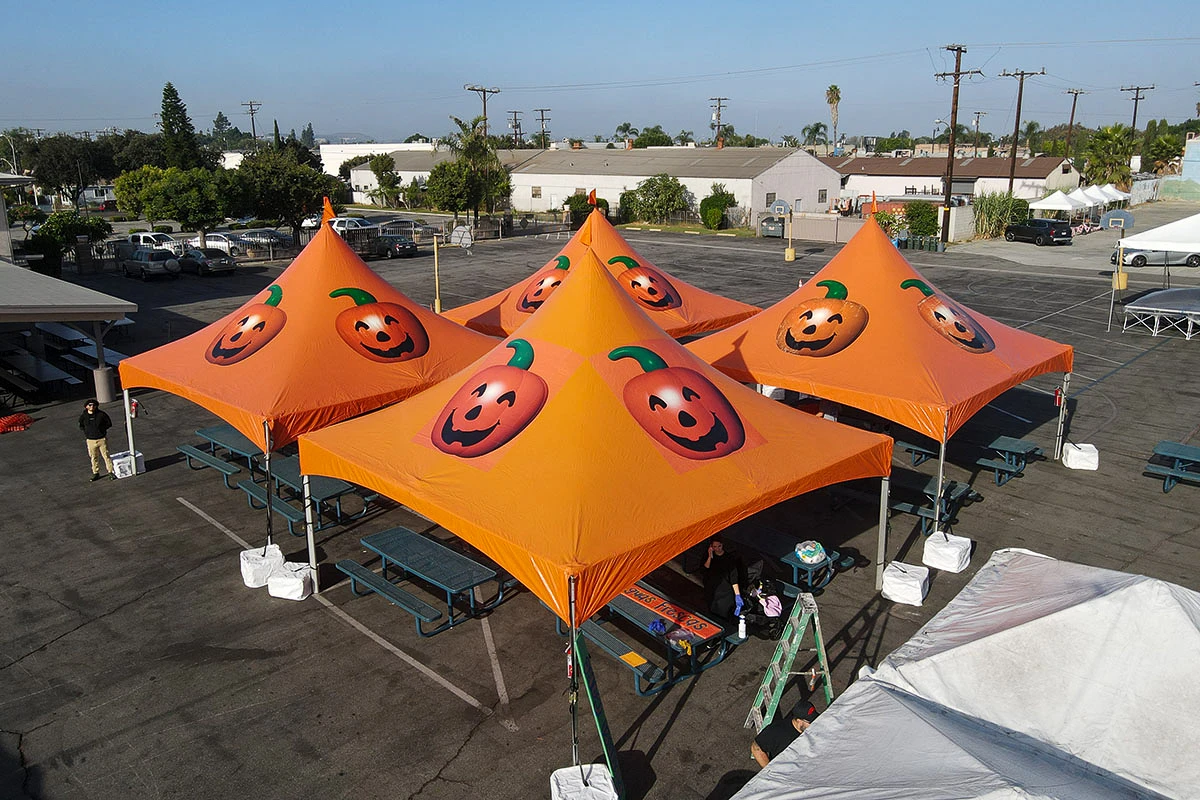 Orange Halloween frame tents with poles