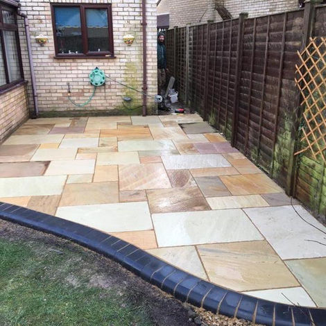 Newly installed sandstone patio