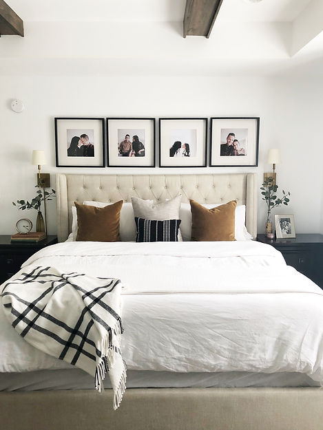 Lisa Clark Design Interior Design Steinbach Winnipeg Manitoba master bedroom king bed white linen brass sconces beams