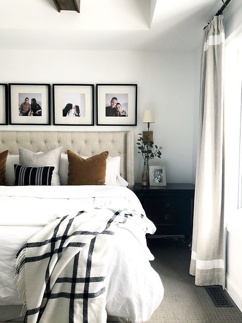 Lisa Clark Design Interior Design Steinbach Winnipeg Manitoba master bedroom king bed white linen brass sconces beams