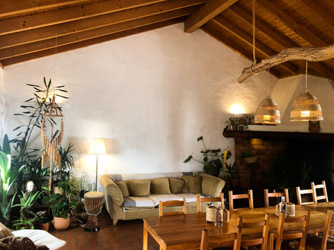 Portuguese dining hall with a rustic ambiance. Experience the warmth and authenticity while savoring delicious vegan cuisine 