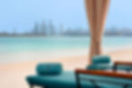 Kempinski Palm Jumeirah - Beach Sunloungers Skyline.jpg