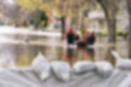 Flooded road with sandbagsAdobeStock_169465415