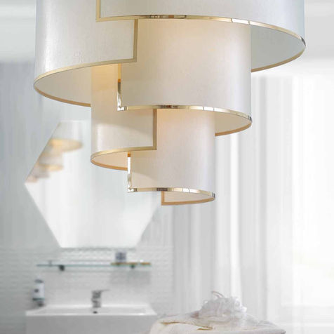 Elegant gold-finished chandelier with a contemporary style, enhancing any luxury interior.