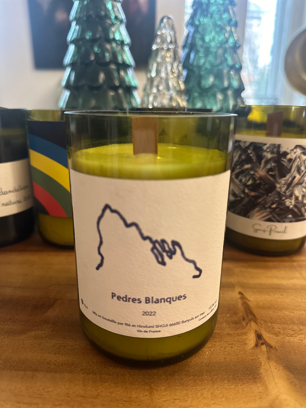 Thumbnail: Cinnamon Roll Scented Recycled Wine Bottle Candles