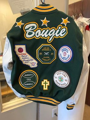 green letterman jacket