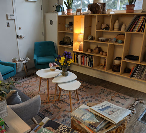 Entrance of Clayroom Potrero showcasing work and books for one to read