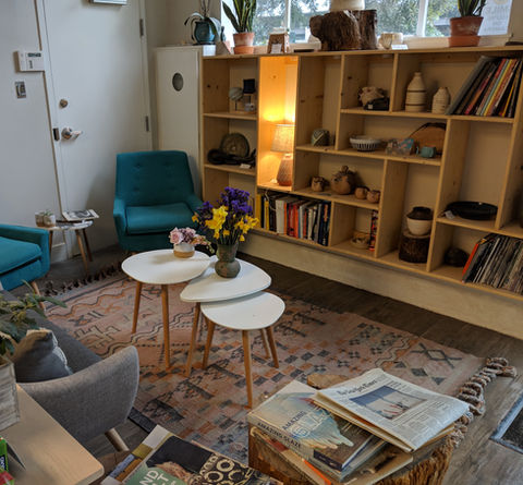 Entrance of Clayroom Potrero showcasing work and books for one to read