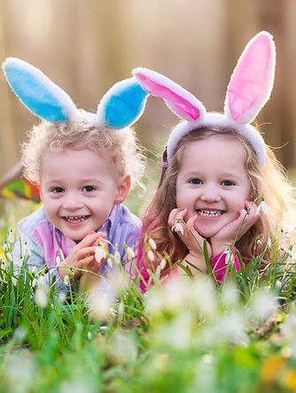 Happy Children with Easter Eggs