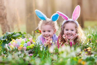 Happy Children with Easter Eggs