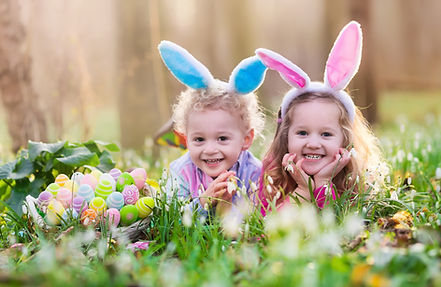 Happy Children with Easter Eggs