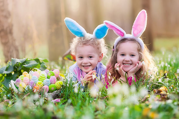 Happy Children with Easter Eggs