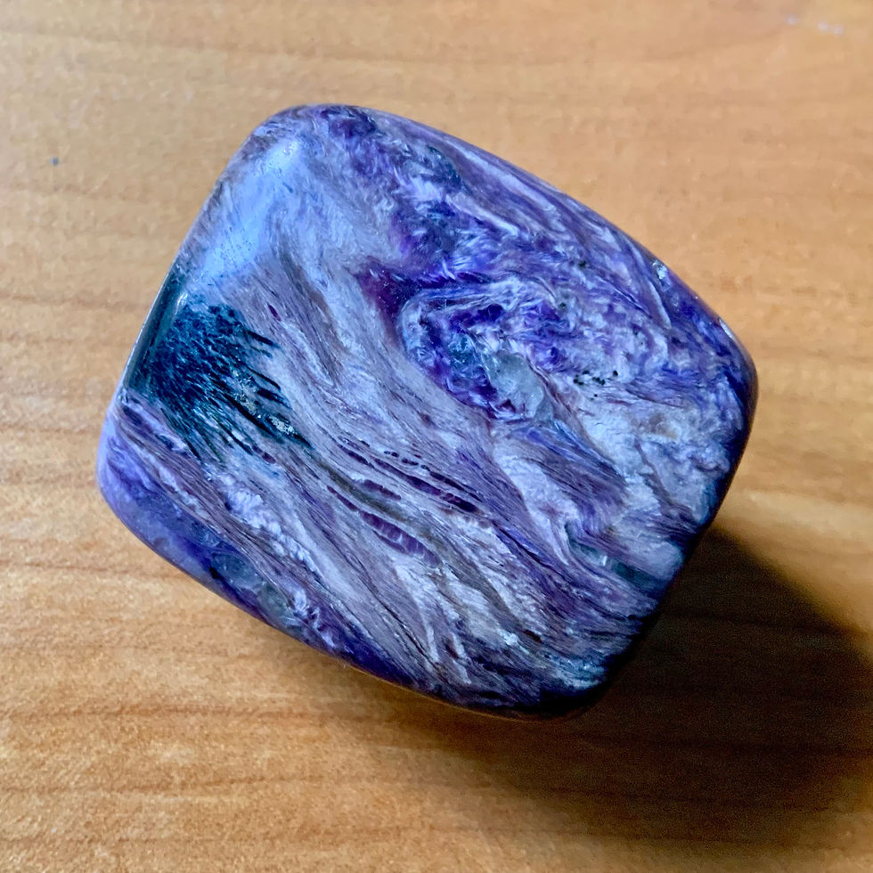 Thumbnail: Charoite crystal polished at metaphysical crystal shop