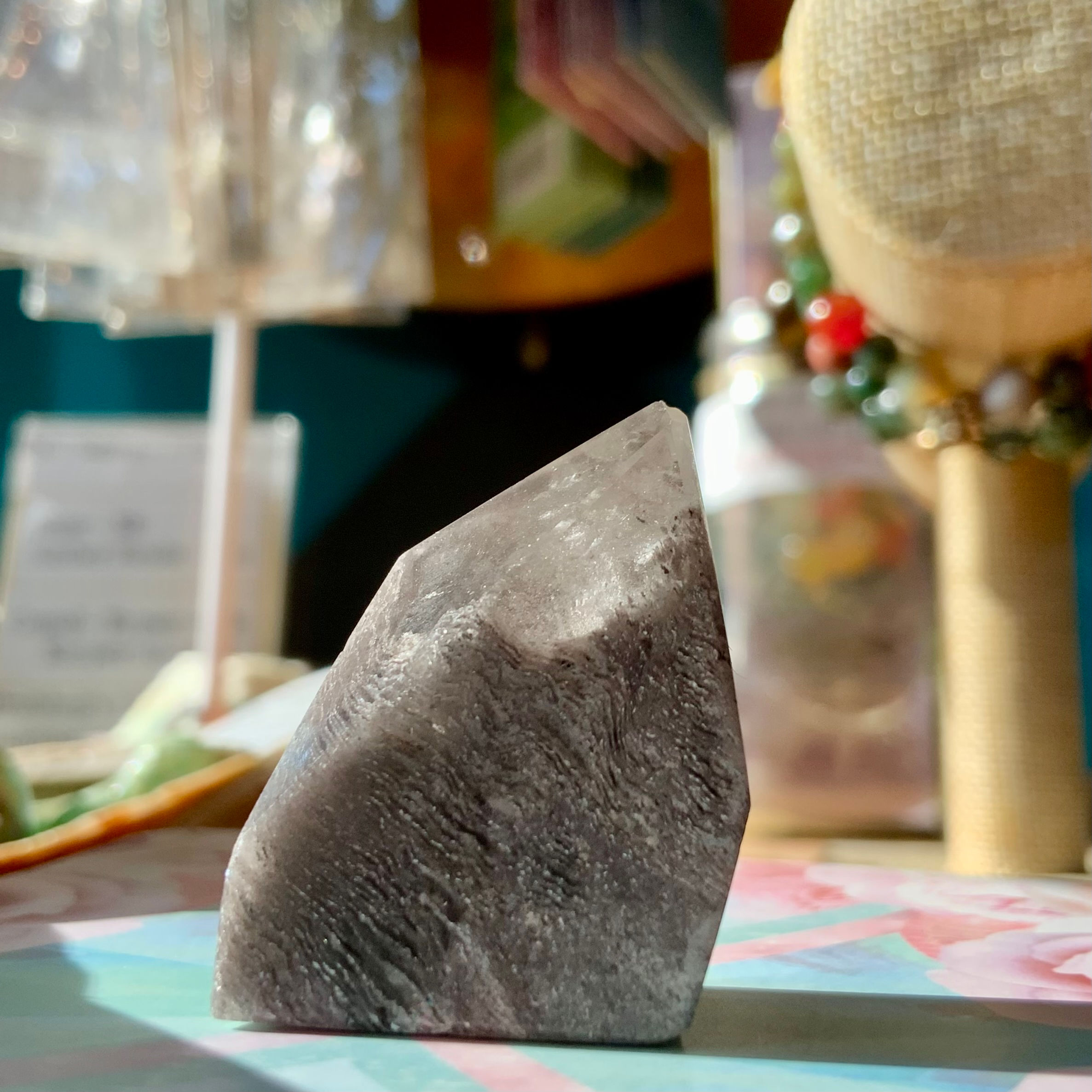 Lithium Quartz freeform carved at metaphysical crystal shop Canada