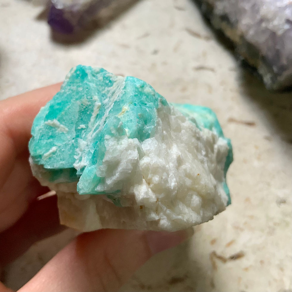 Thumbnail: Raw Amazonite chunk with smoky quartz at metaphysical crystal shop Canada